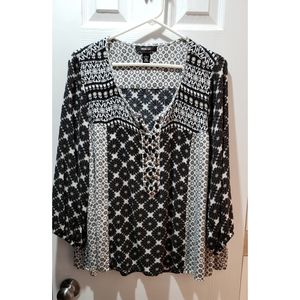 Unique loose sleeved top.